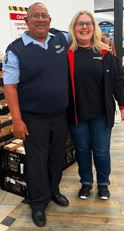 Community partners standing together during a donation run.