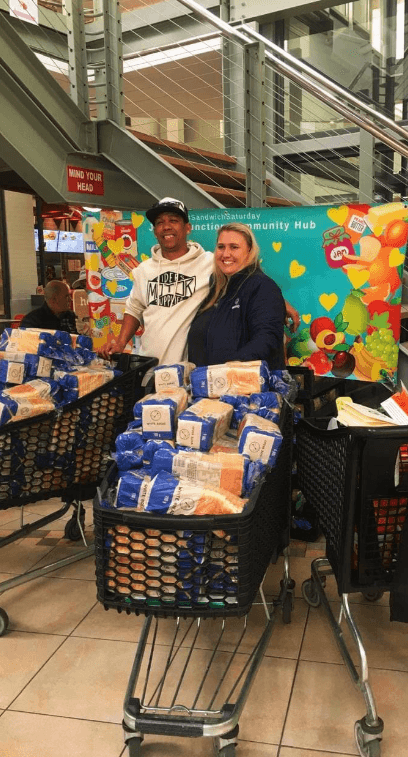 Janet's Junction volunteers with donated food supplies