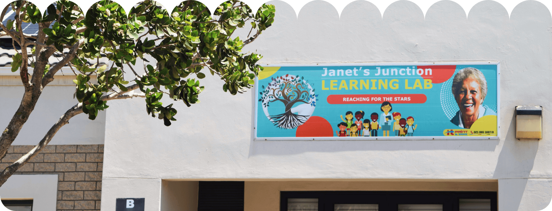Janet's Junction Learning Lab banner on the building exterior